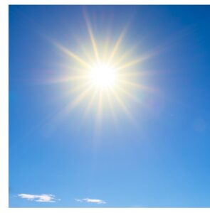 Image of the hot sun in a blue sky