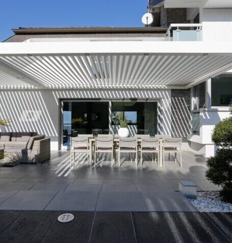 An image of a wall mounted aluminium pergola
